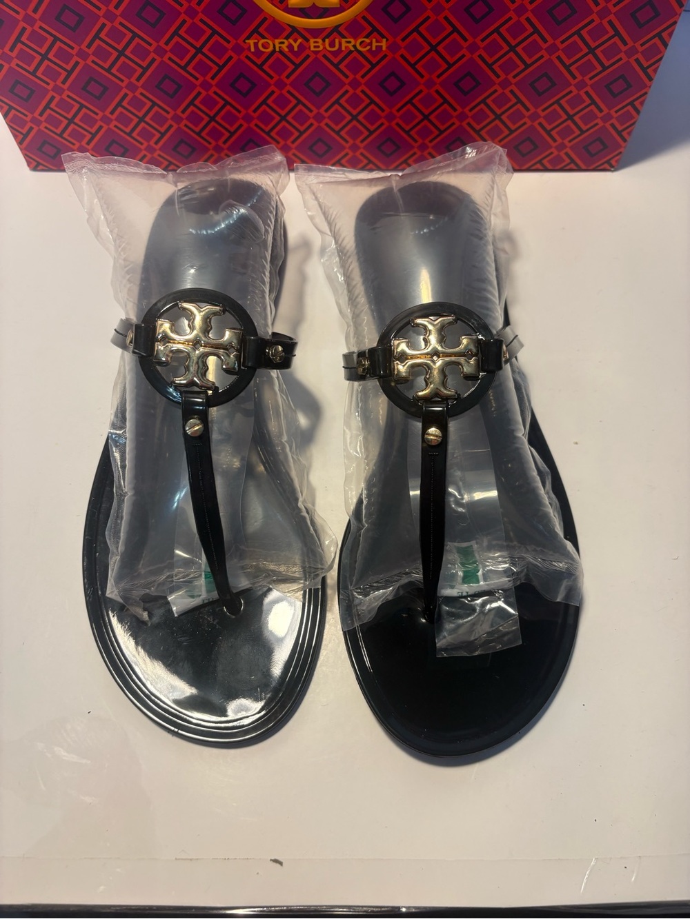 Tory Burch Black Jelly T-Strap Sandals with Gold Double-T Emblem